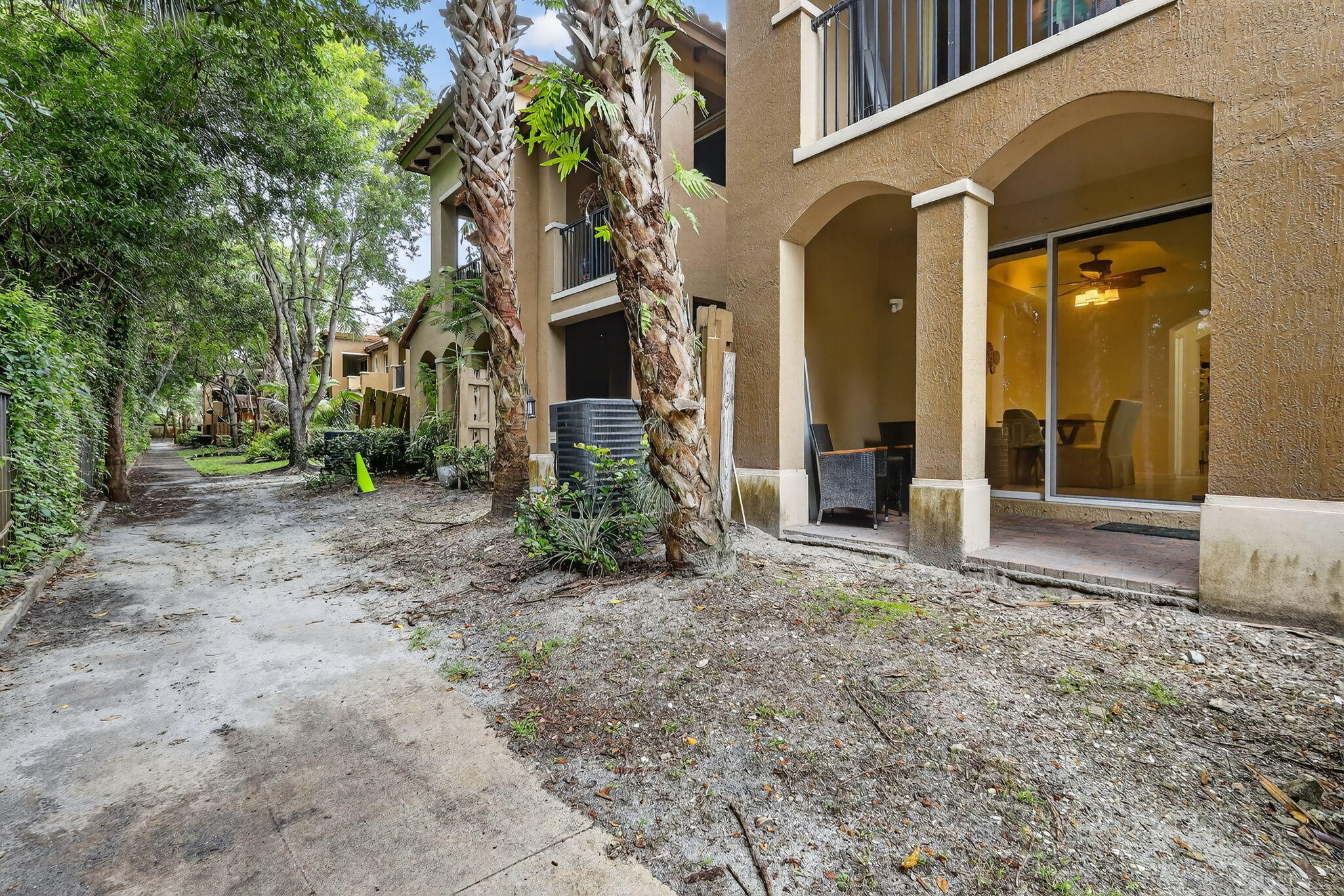 2931 Hope Valley Street, Unit 405 West Palm Beach, FL 33411 - Photo 18 of 35 a view of a house with a backyard