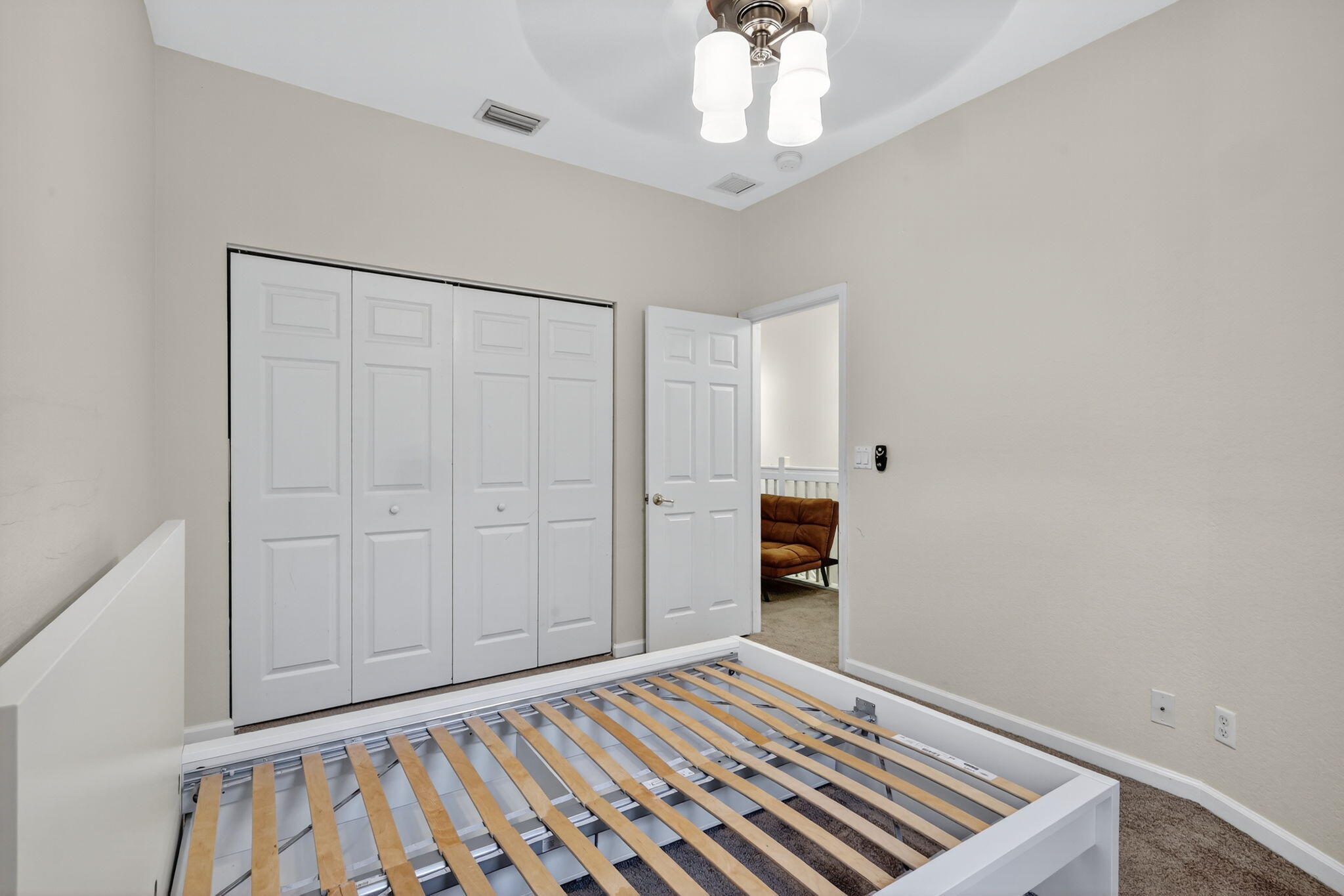 2931 Hope Valley Street, Unit 405 West Palm Beach, FL 33411 - Photo 32 of 35 a view of an empty room with a window