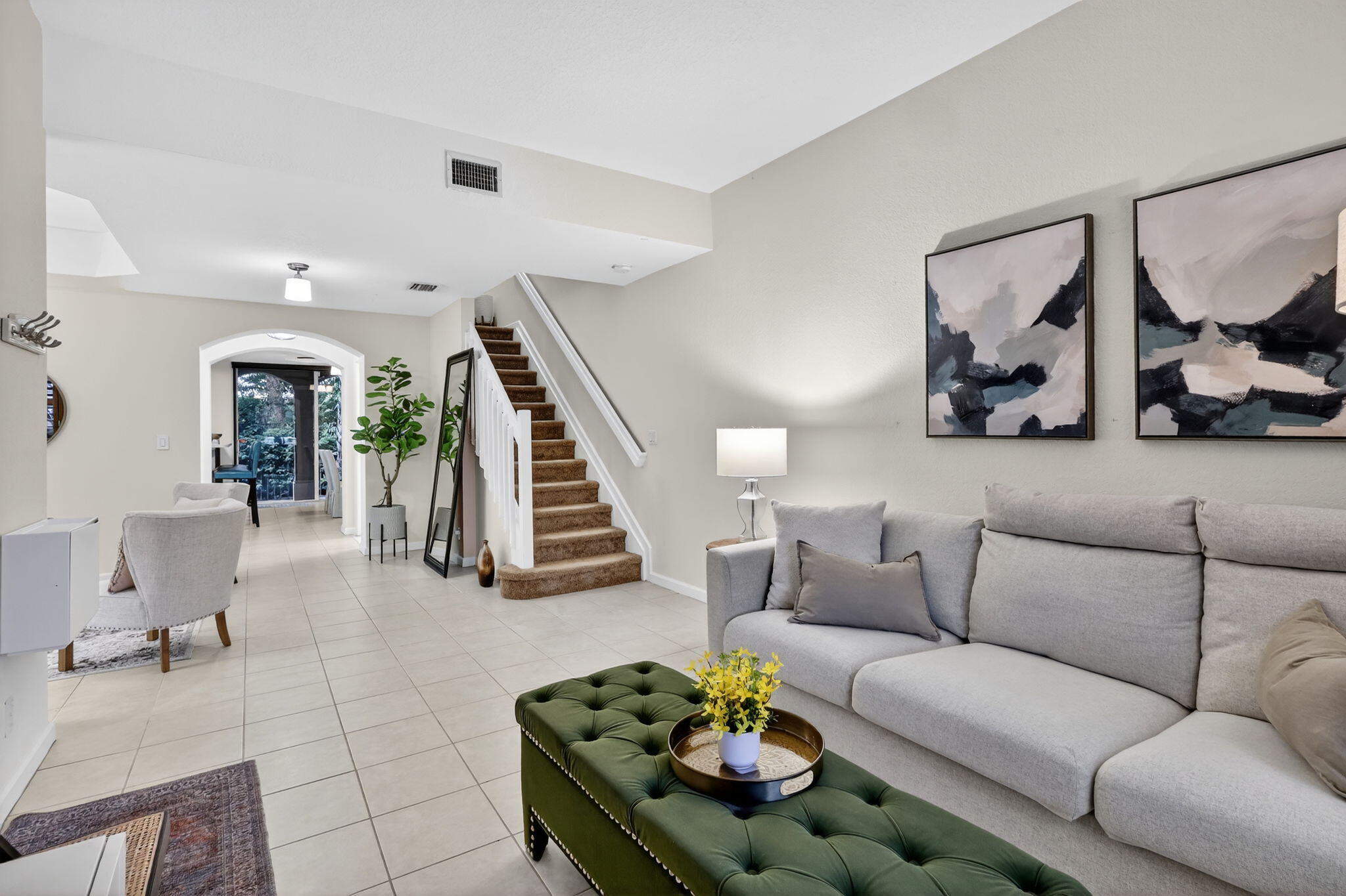 2931 Hope Valley Street, Unit 405 West Palm Beach, FL 33411 - Photo 5 of 35 a living room with furniture and a couch