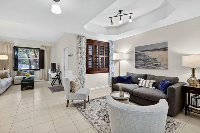 a living room with furniture and a couch