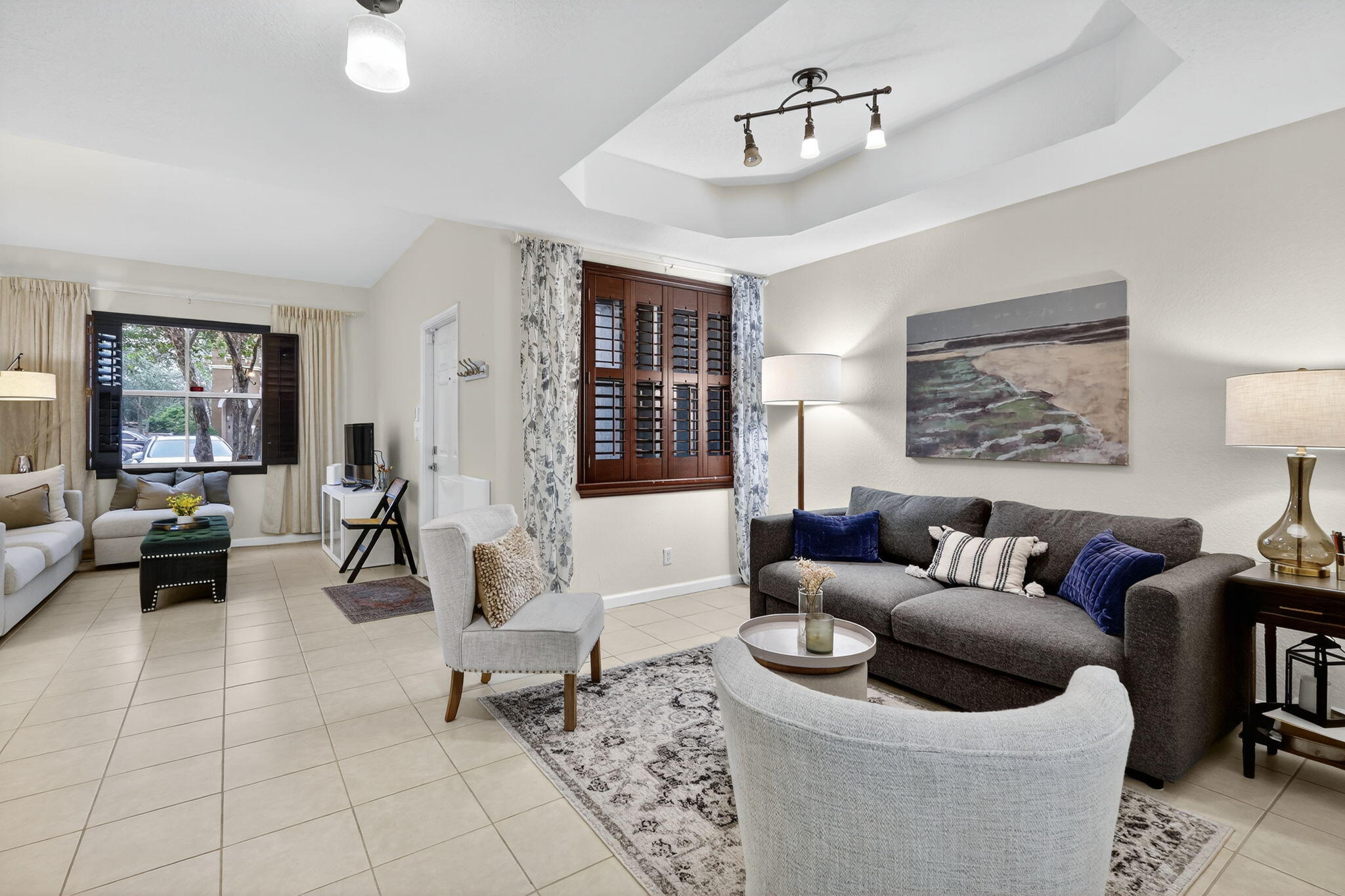 2931 Hope Valley Street, Unit 405 West Palm Beach, FL 33411 - Photo 8 of 35 a living room with furniture and a couch