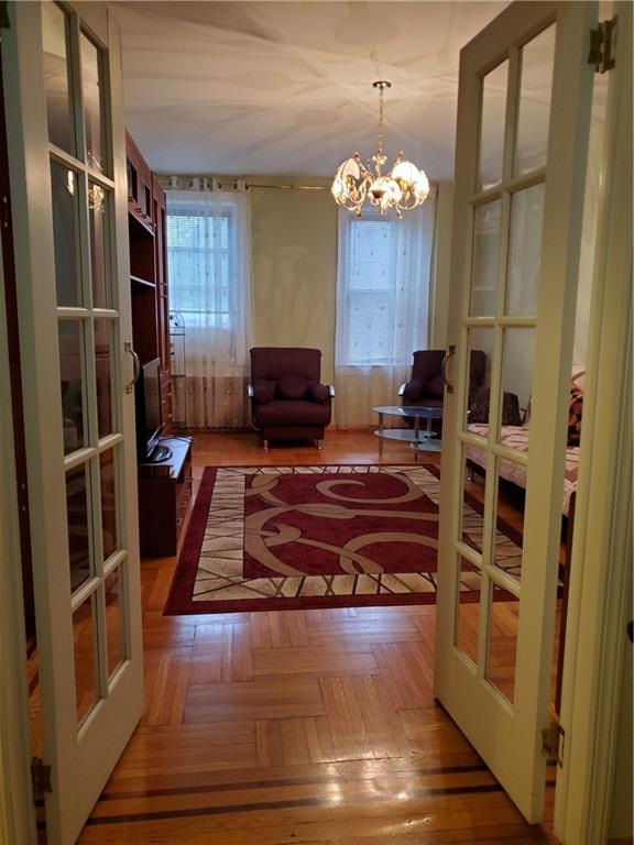 a kitchen with kitchen island granite countertop a refrigerator and a stove
