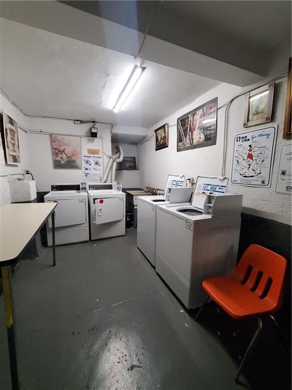1053 East 13th Street, Unit B1 Brooklyn, NY 11230 - Photo 16 of 17 a room with furniture and wall paintings