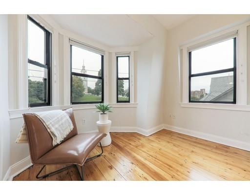 14 Thomas Park Boston, MA 02127 - Photo 13 of 20 a living room with furniture and a window