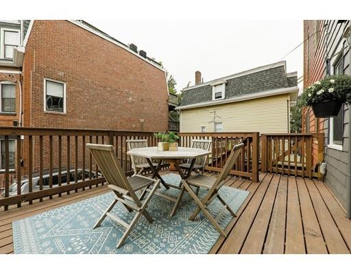 14 Thomas Park Boston, MA 02127 - Photo 18 of 20 a view of a chairs and table on the terrace