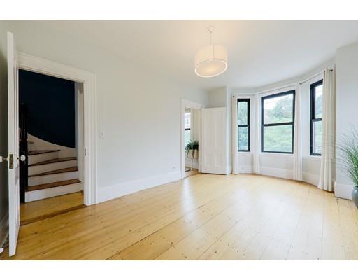14 Thomas Park Boston, MA 02127 - Photo 10 of 20 a view of an empty room with wooden floor and a window