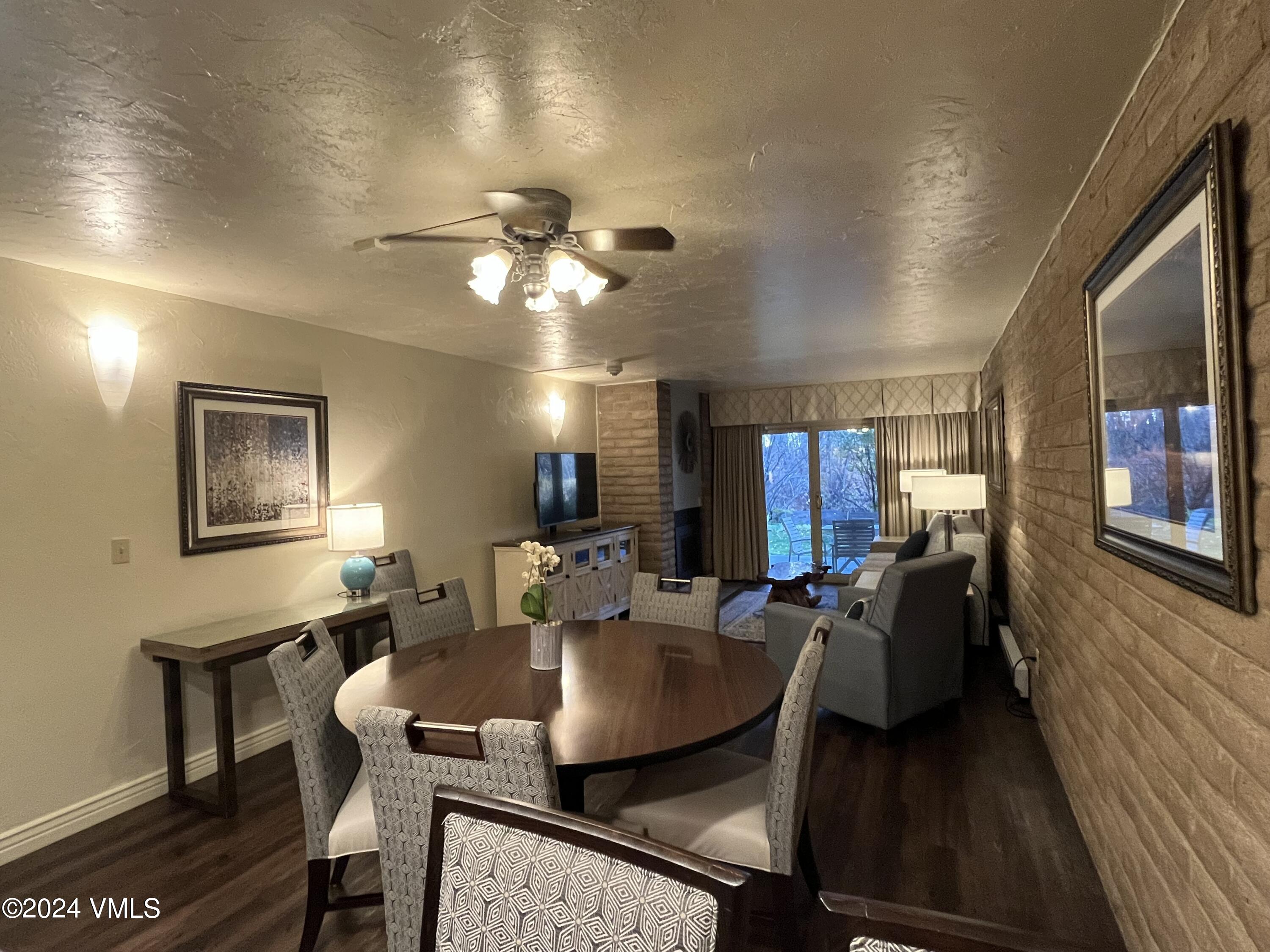 1020 Vail View Drive, Unit 310438 Vail, CO 81657 - Photo 4 of 25 a view of a dining room with furniture