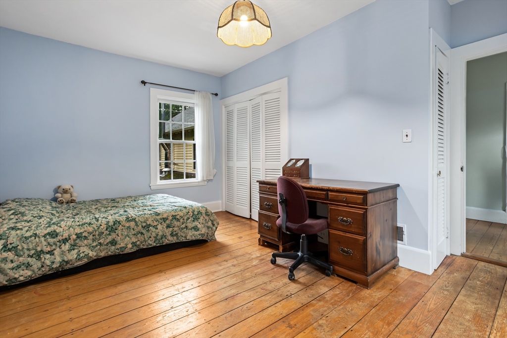 244 Lincoln Road Lincoln, MA 01773 - Photo 23 of 41 a bedroom with bed and a window