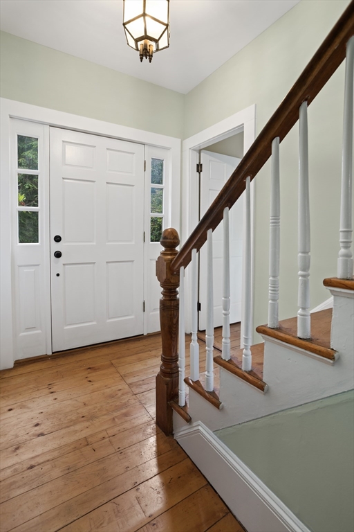 244 Lincoln Road Lincoln, MA 01773 - Photo 5 of 41 a view of entryway with wooden floor and stairs