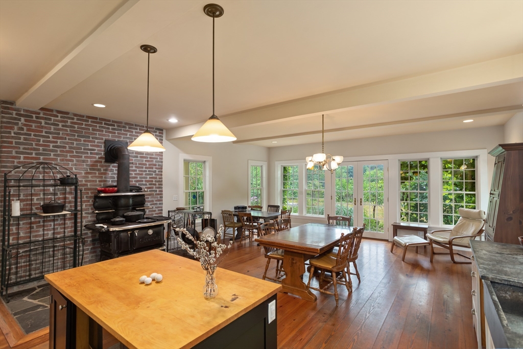 244 Lincoln Road Lincoln, MA 01773 - Photo 10 of 41 a view of a dining room with furniture window and outside view