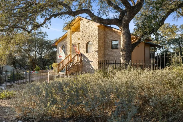a backyard of a house with lots of green space