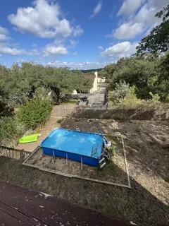 a view of a yard with an outdoor space