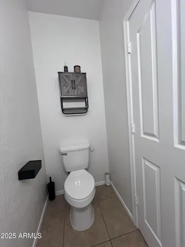a bathroom with a toilet
