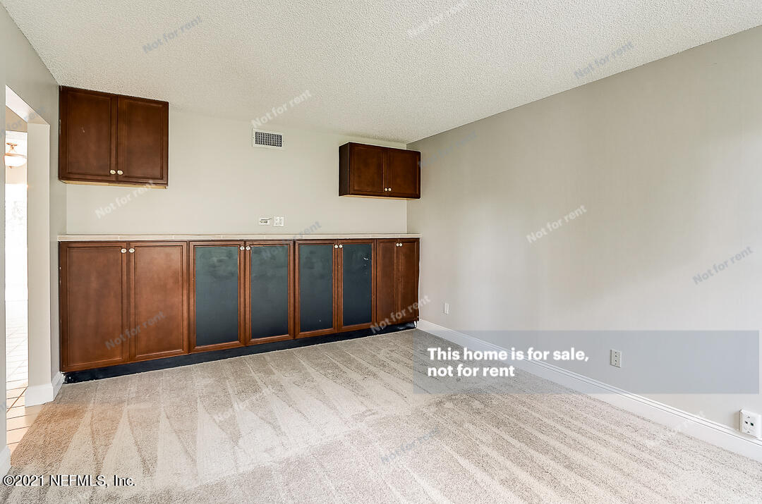 328 North Ridge Drive Orange Park, FL 32003 - Photo 12 of 33 a view of a livingroom with an empty space