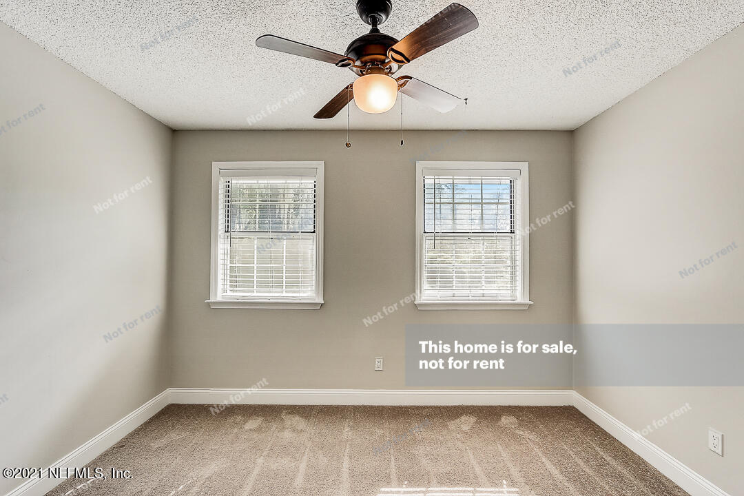 328 North Ridge Drive Orange Park, FL 32003 - Photo 18 of 33 a view of an empty room with a window