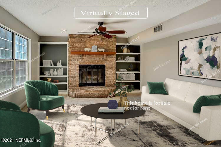 328 North Ridge Drive Orange Park, FL 32003 - Photo 2 of 33 a living room with furniture and a fireplace