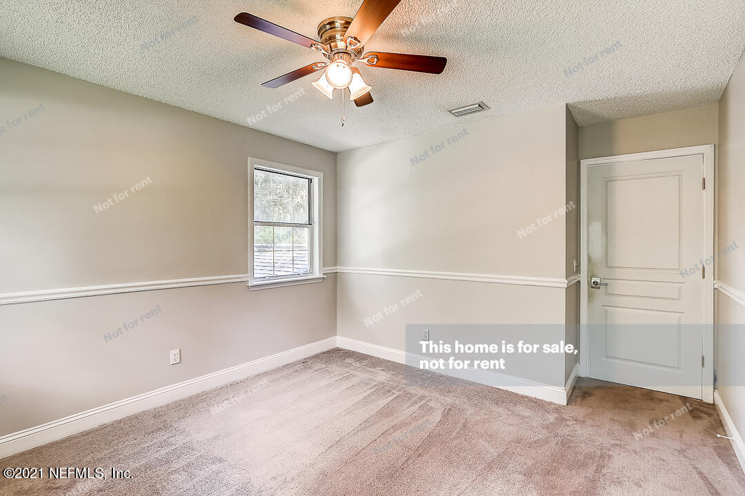 328 North Ridge Drive Orange Park, FL 32003 - Photo 21 of 33 a view of an empty room with a window
