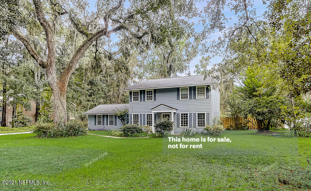 328 North Ridge Drive Orange Park, FL 32003 - Photo 10 of 33 a view of a house with garden and trees