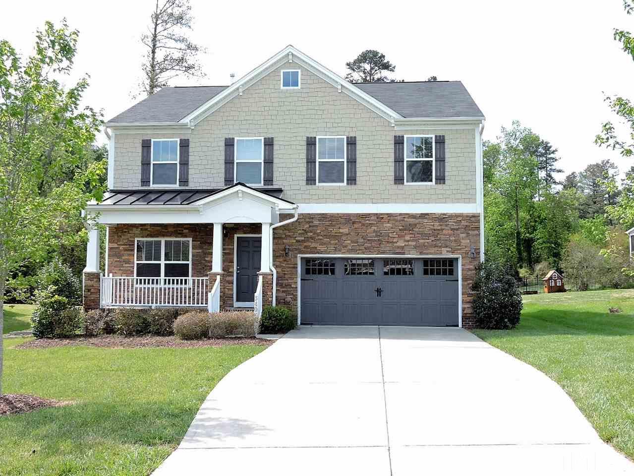 3406 Alman Drive Durham, NC 27705 - Photo 1 of 23 a front view of a house with a garden