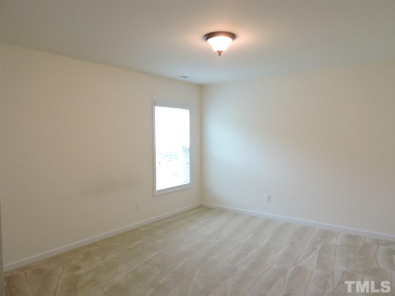 3406 Alman Drive Durham, NC 27705 - Photo 15 of 23 an empty room with a window
