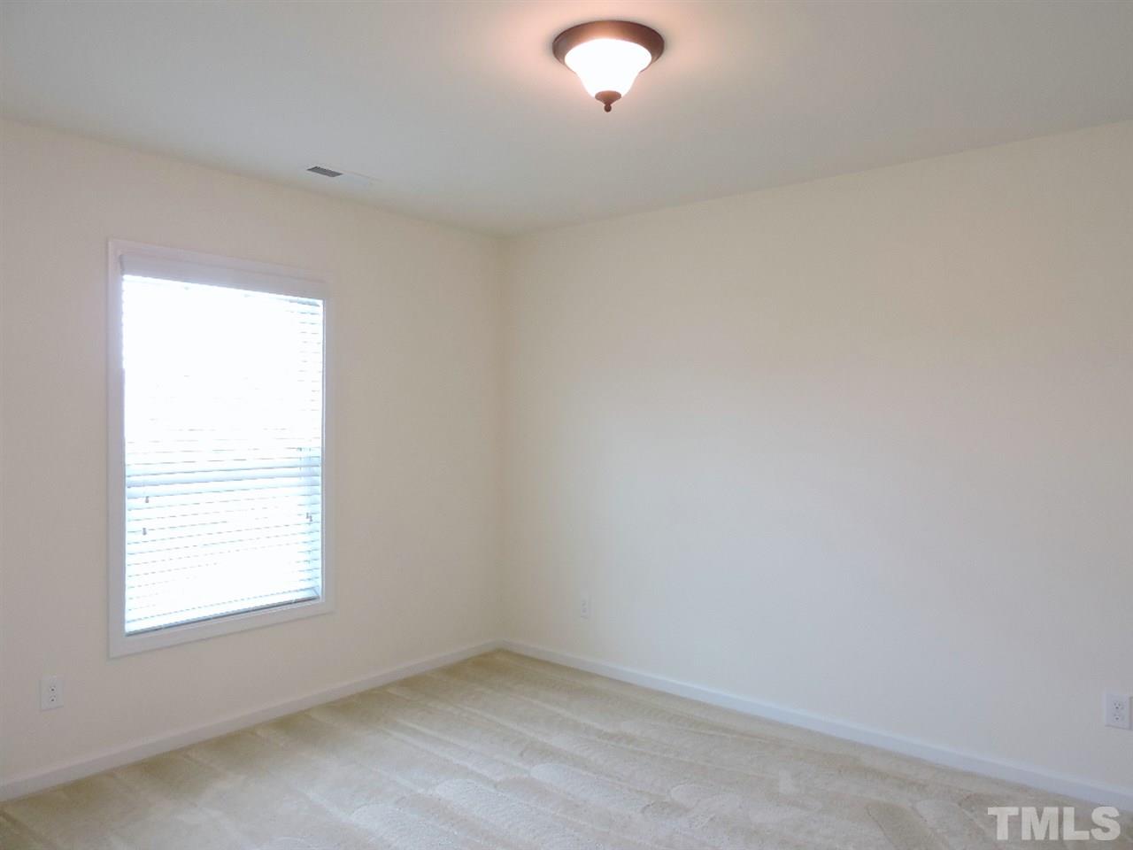 3406 Alman Drive Durham, NC 27705 - Photo 16 of 23 an empty room with a window