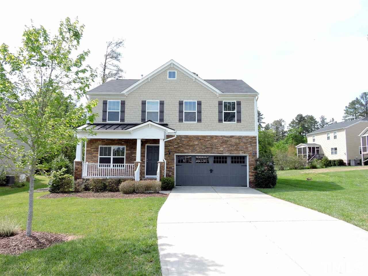 3406 Alman Drive Durham, NC 27705 - Photo 22 of 23 a front view of a house with a yard