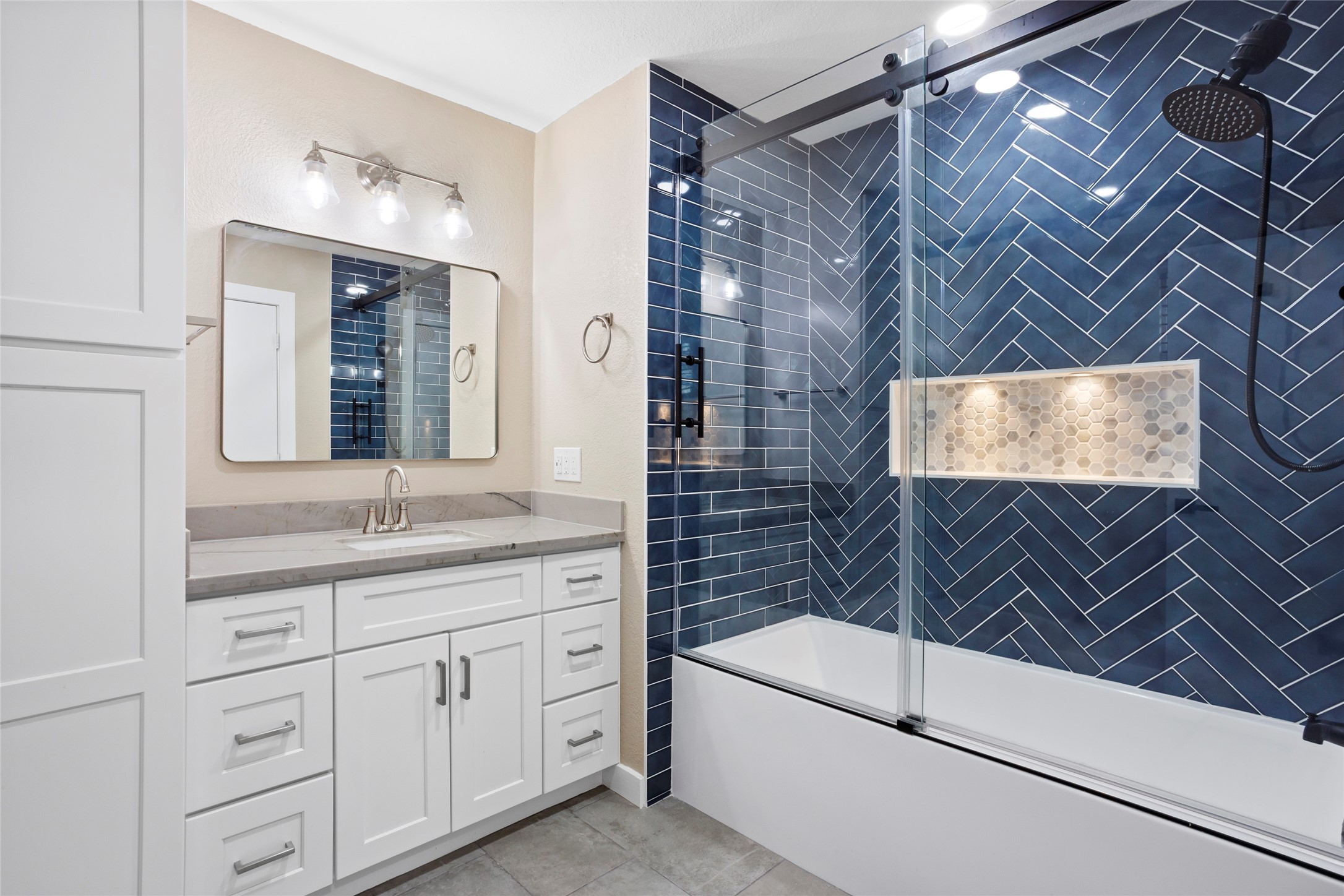 3105 Garrow Street Houston, TX 77003 - Photo 17 of 26 Beautifully renovated bathroom with updated finishes.