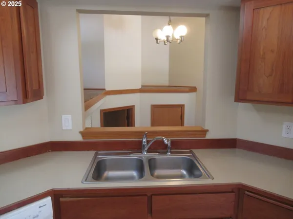a kitchen with a sink and a cabinets