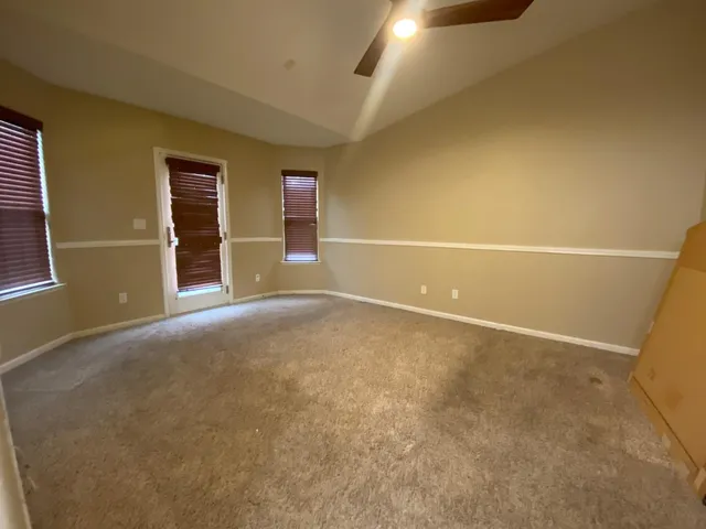 a view of a room with an empty space