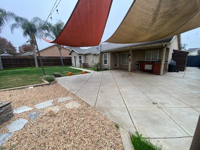 a view of a house with a patio