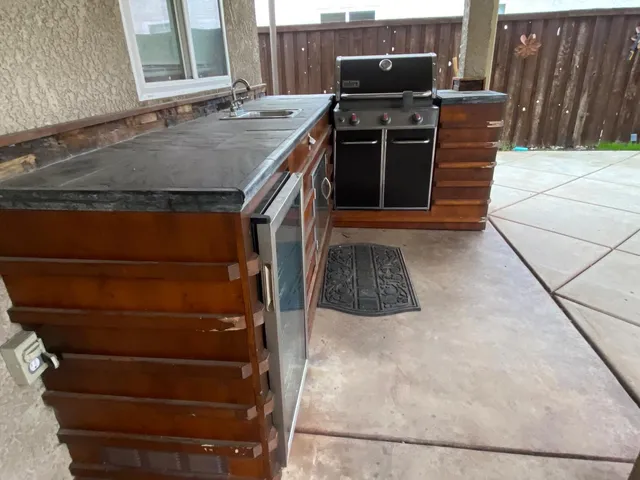 a room with a sink and a mirror