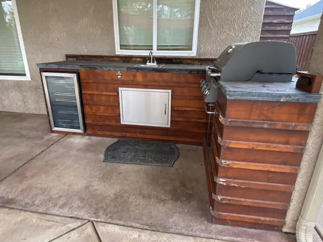 a room with a sink and a mirror