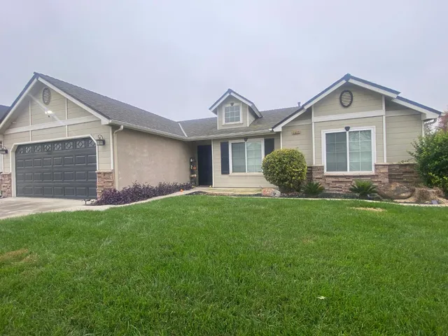 a view of outdoor space yard and front view of a house