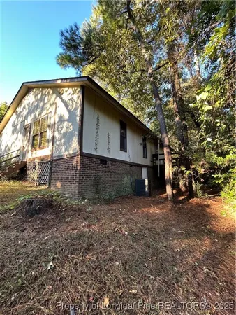 a view of a balcony with plants