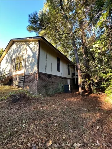 a view of a balcony with plants