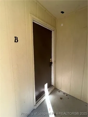 a kitchen with stainless steel appliances a refrigerator and a sink