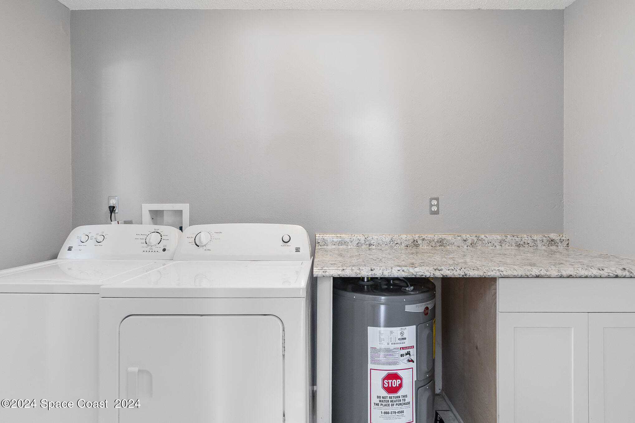 2357 Sarno Road Melbourne, FL 32935 - Photo 14 of 19 a utility room with dryer and washer