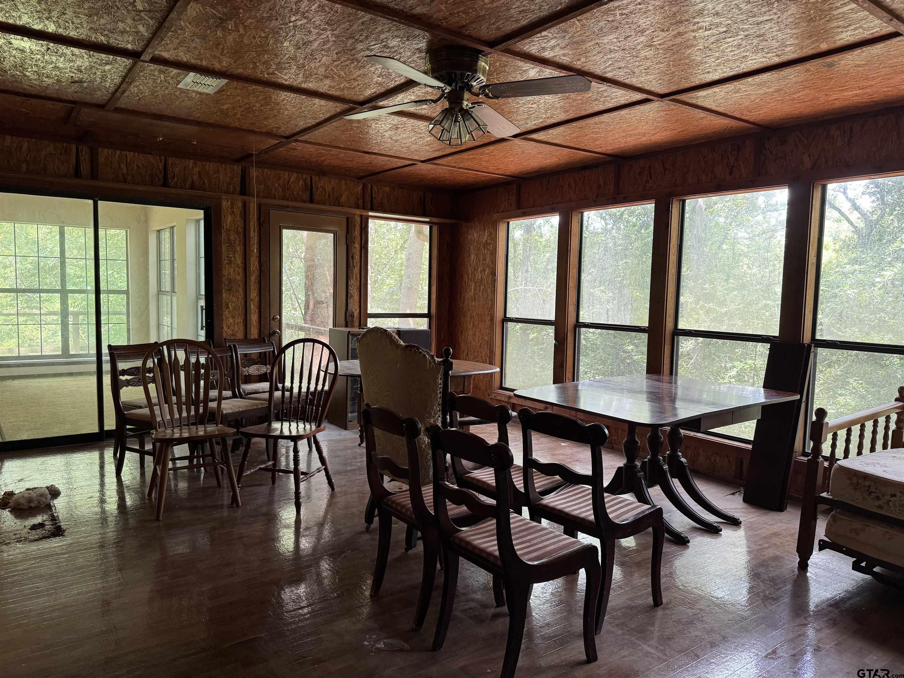 289 Llano Bend Holly Lake Ranch, TX 75765 - Photo 7 of 48 a view of a dining room with furniture window and outside view