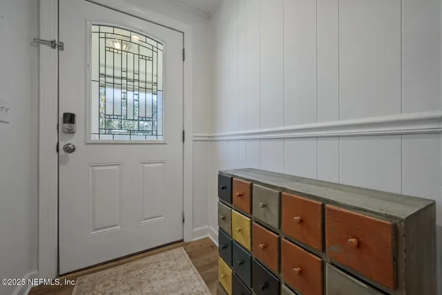 a view of storage and utility room with closet