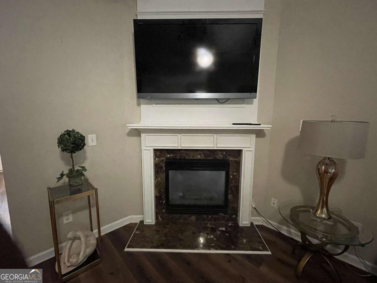 4230 Vinca Way Union City, GA 30291 - Photo 12 of 28 a living room with furniture and a fireplace
