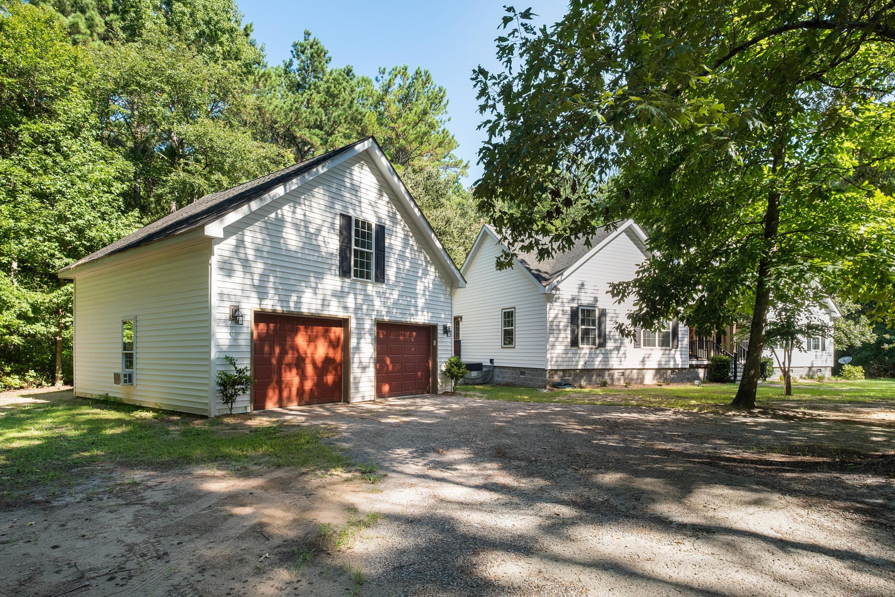 1360 Whippoorwill Farm Road Johns Island, SC 29455 - Photo 3 of 33 Front with garage
