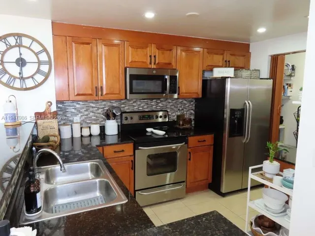 $449,000 | 215 Southwest 42nd Avenue, Unit PH08, Miami, FL 33134