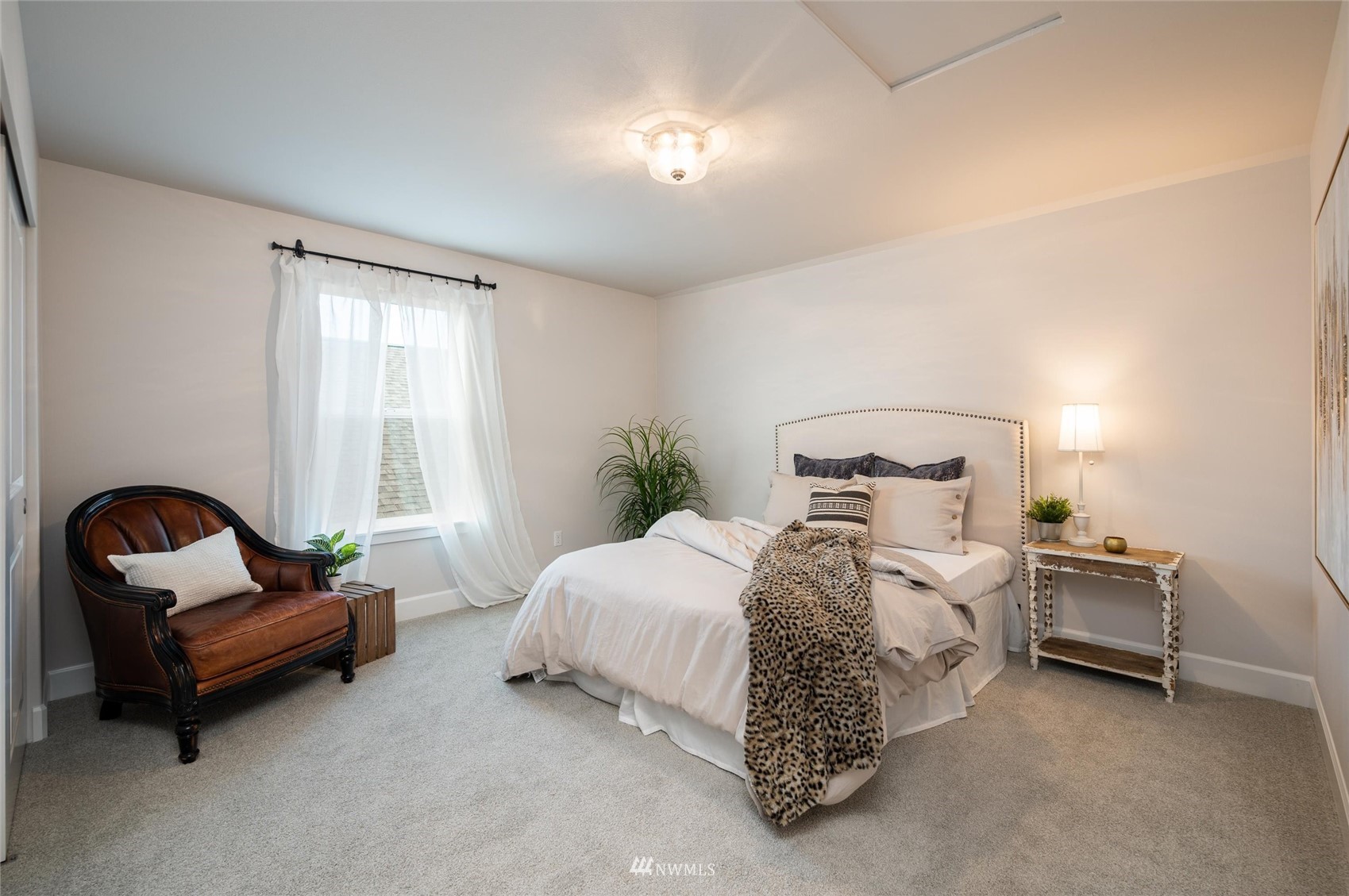 1375 Woods Point Loop Ferndale, WA 98248 - Photo 15 of 19 a bed room with a bed chair and a window