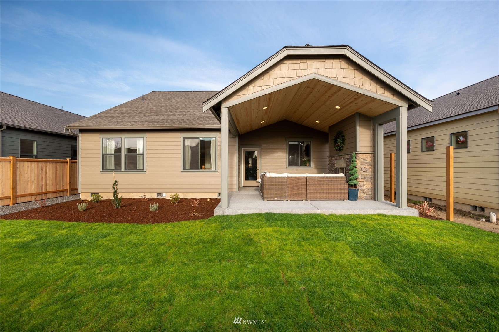 1375 Woods Point Loop Ferndale, WA 98248 - Photo 19 of 19 a front view of a house with a yard and garage