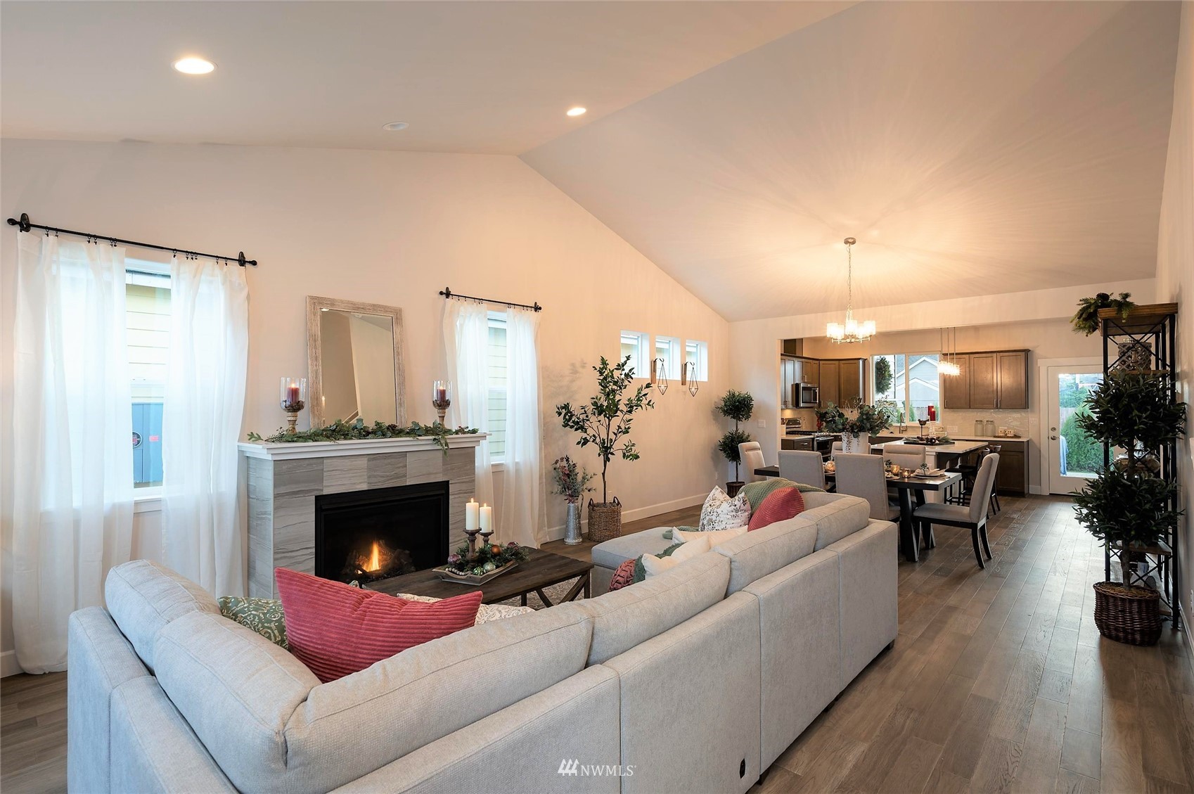 1375 Woods Point Loop Ferndale, WA 98248 - Photo 5 of 19 a living room with furniture flat screen tv and a fireplace