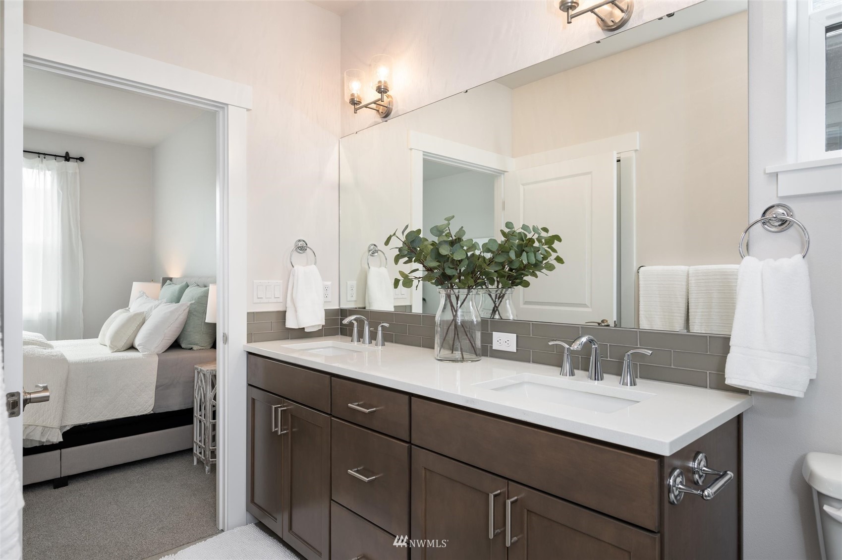 1375 Woods Point Loop Ferndale, WA 98248 - Photo 10 of 19 a bathroom with a sink double vanity and a mirror