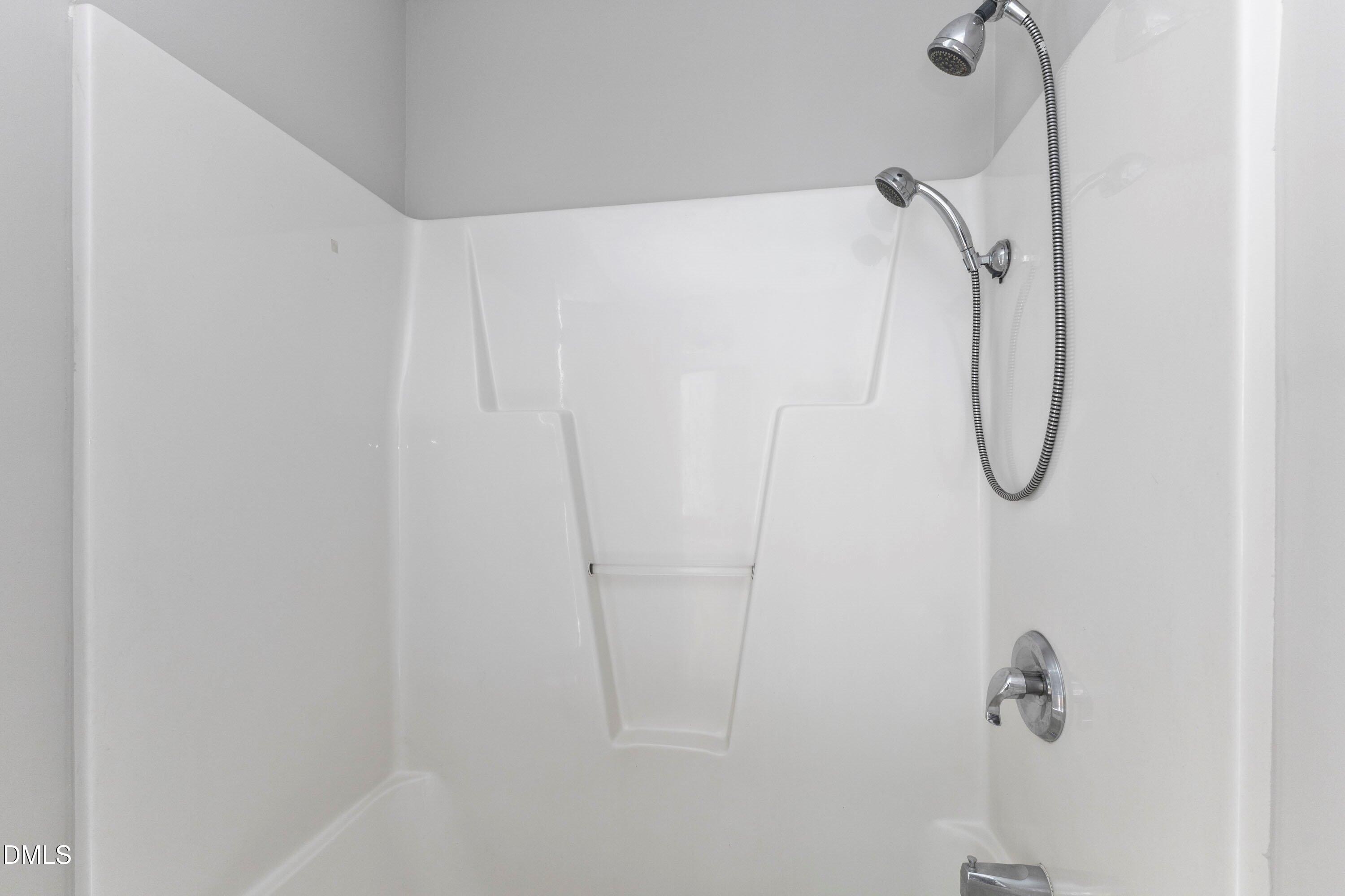 3358 Tarleton West Durham, NC 27713 - Photo 22 of 23 a bathroom with a shower