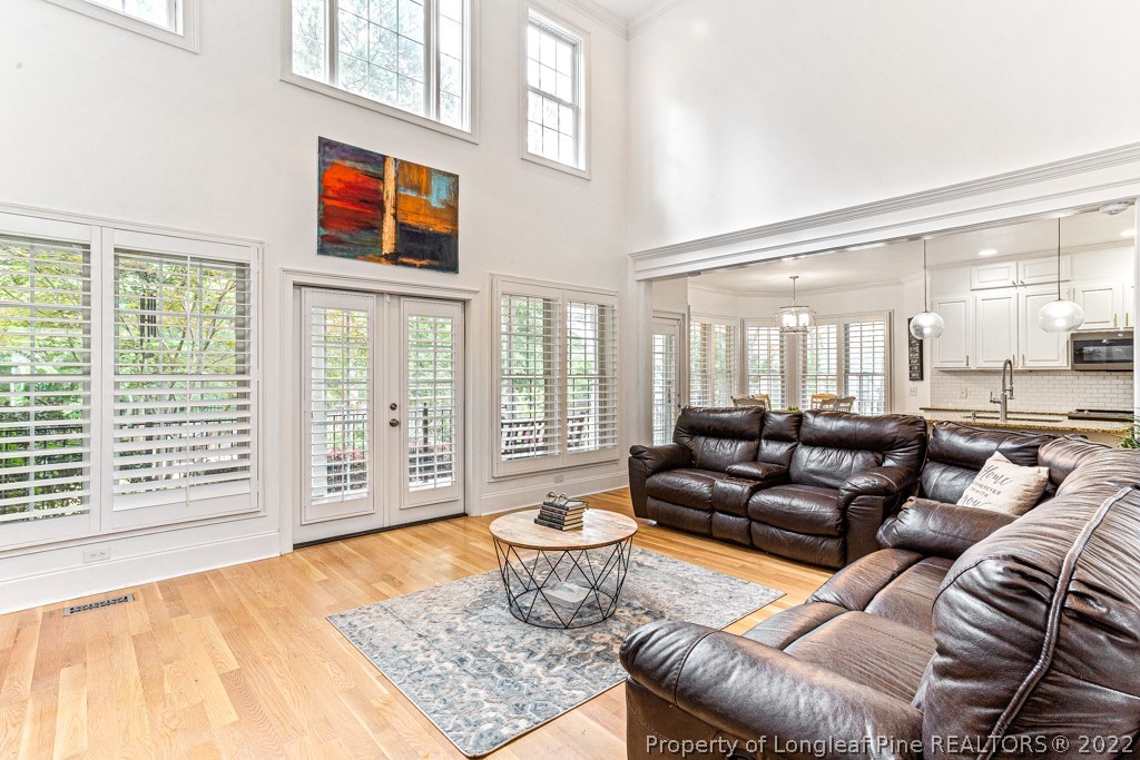 126 Falling Water Road Spring Lake, NC 28390 - Photo 19 of 47 a living room with furniture and a large window