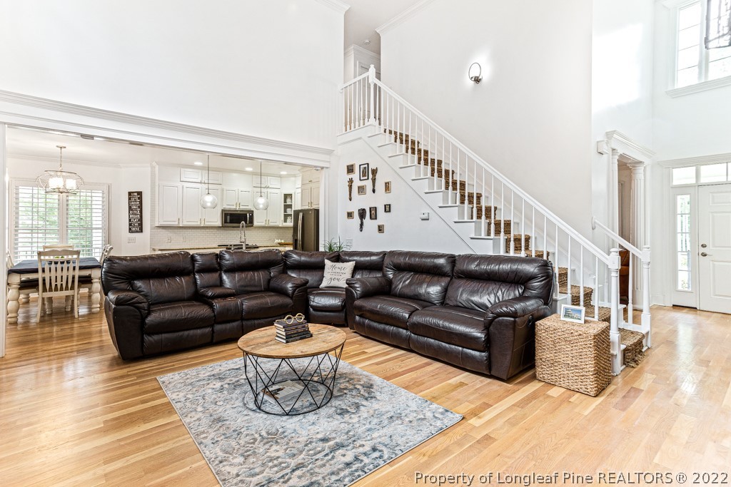 126 Falling Water Road Spring Lake, NC 28390 - Photo 20 of 47 a living room with furniture or wooden floor and a large window