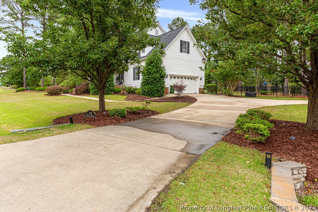 126 Falling Water Road Spring Lake, NC 28390 - Photo 3 of 47 a view of backyard of house with green space